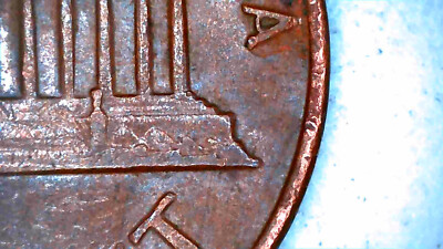 1969-D penny No FG error reverse showing missing Frank Gasparro initials at lower right of Lincoln Memorial versus normal example