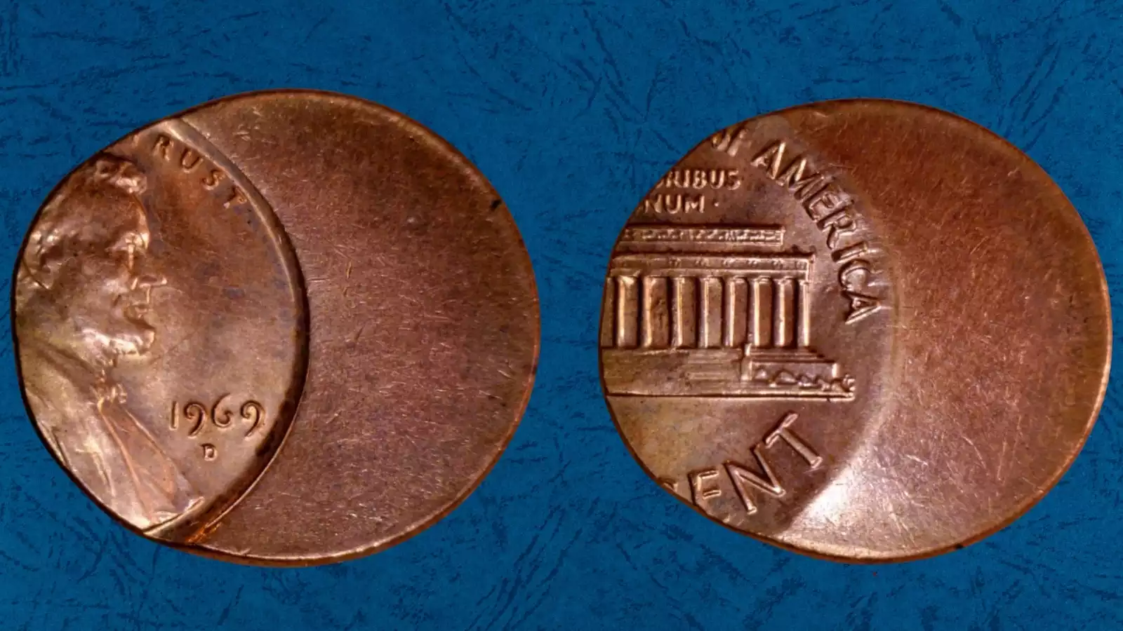 1969 Lincoln penny struck 40% off-center showing crescent blank area with full date visible